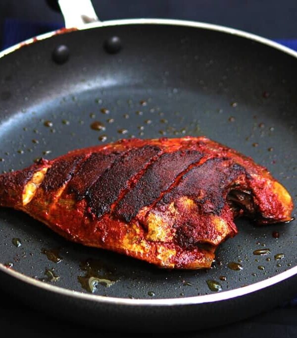A picture of Mangalorean Chili, Salt and Vinegar Marinade + Fish Fry in a black pan.
