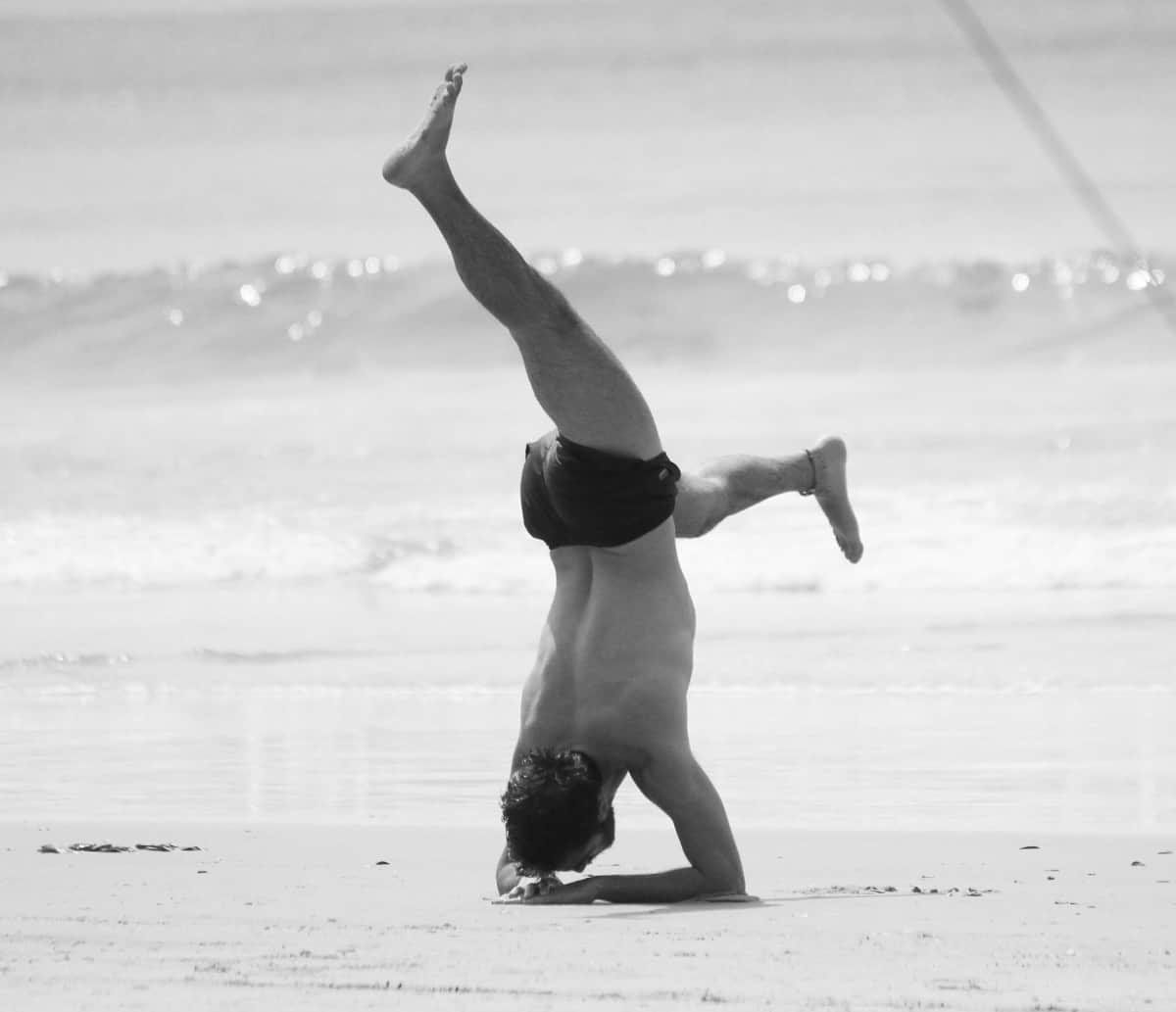 A picture of a man doing a headstand from my Holiday.