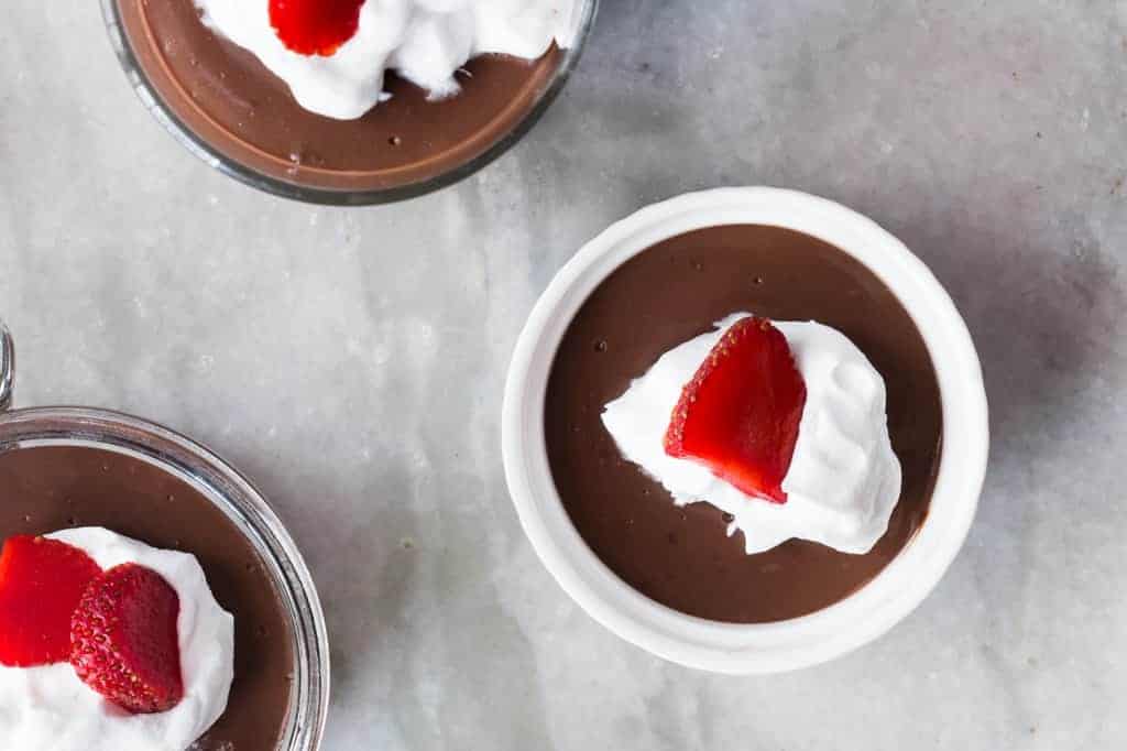 chocolate pudding served in small cups and bowls