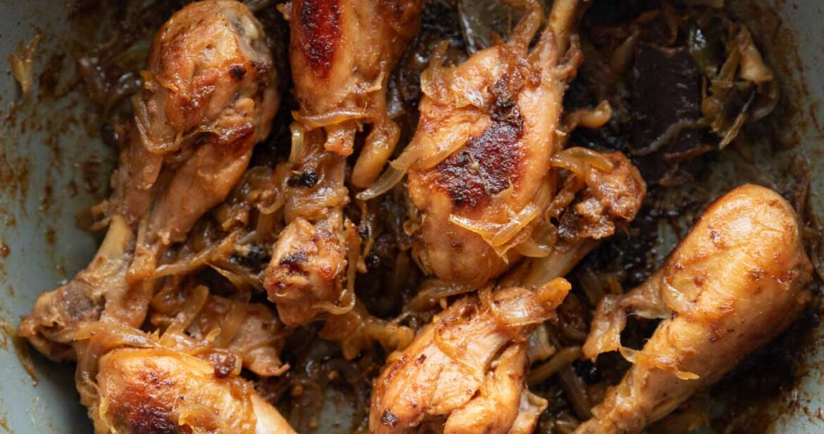 A picture of Quick Chicken with Caramelized Onions in a grey pan