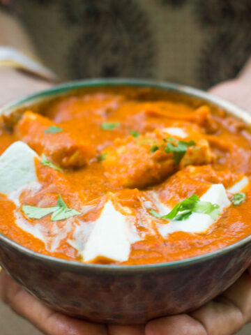 Healthy Paneer Makhani garnished with coriander and served in a brown bowl