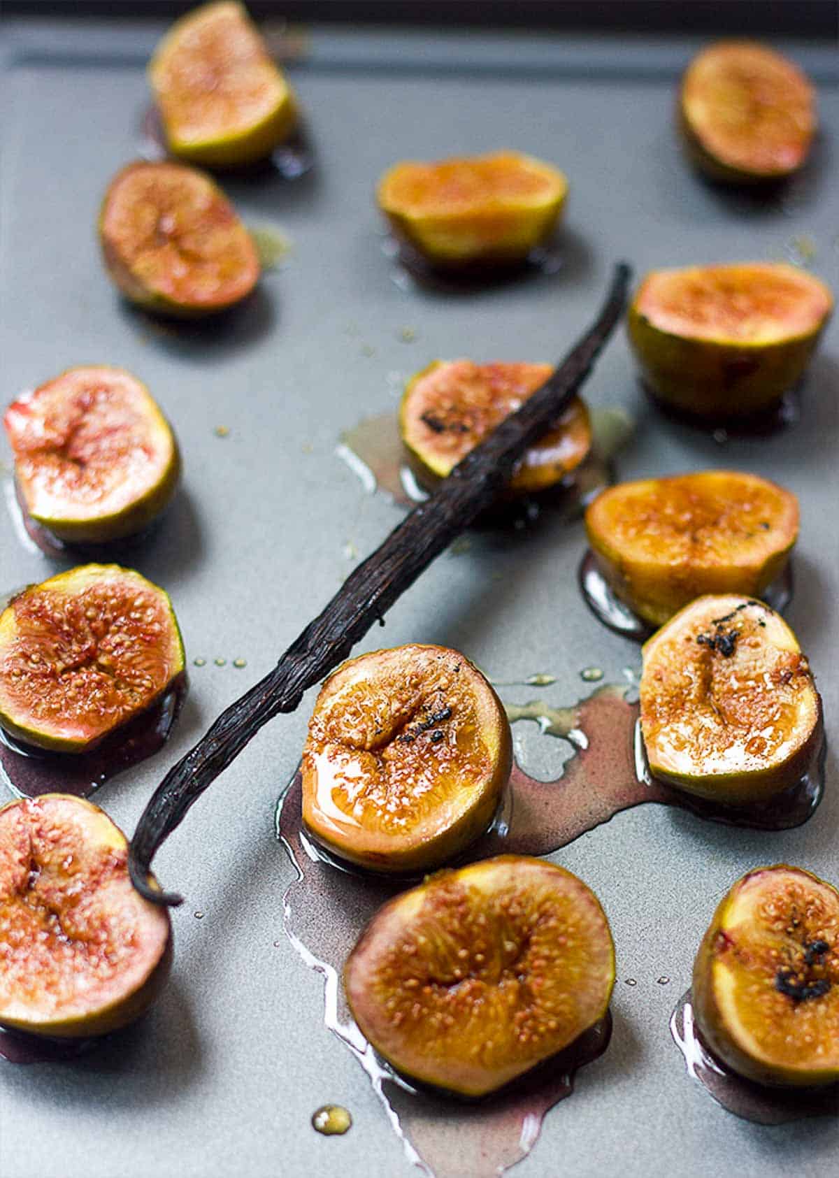 Vanilla bean alongside the figs drizzled with honey.