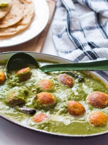 The Healthy Palak Paneer Kofta Curry served in a dish.