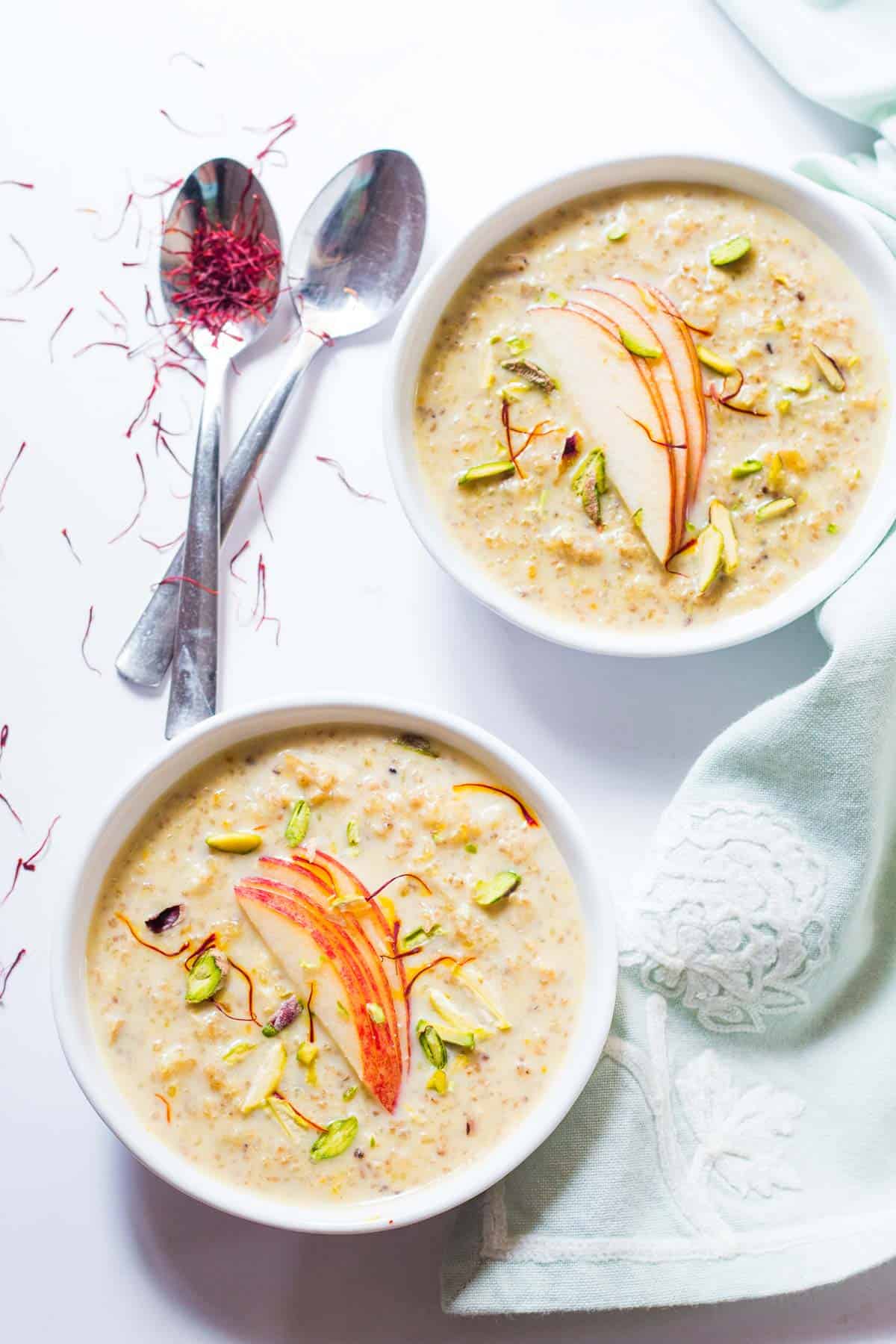 The Healthy Quinoa Apple Kheer served in white bowls.