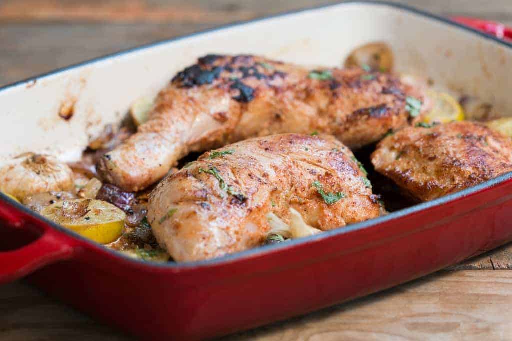 sumac chicken in a red pan