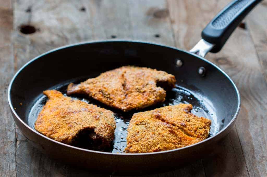 the fried fish coated with rava aka semolina in a pan