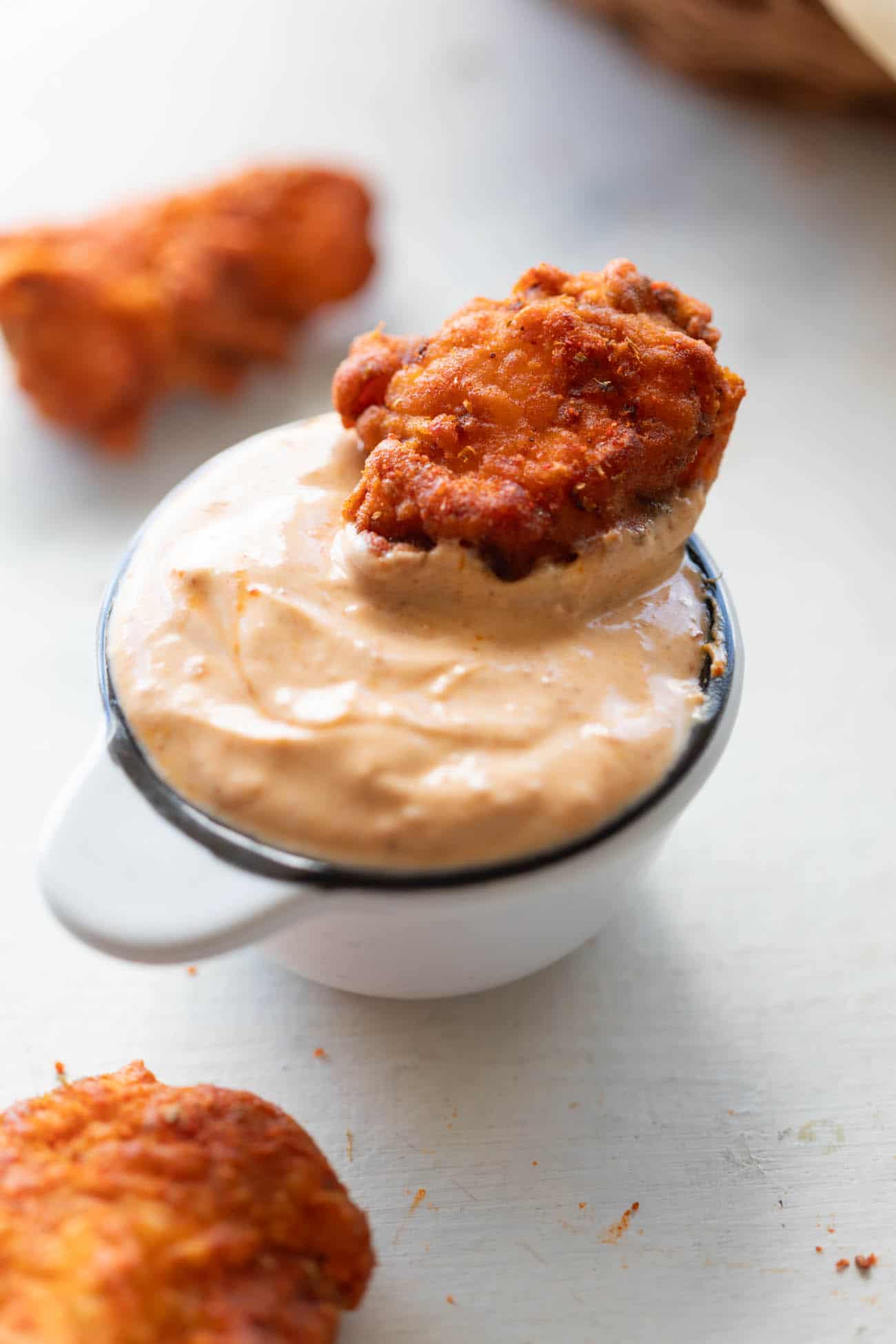 The popcorn chicken served with Sriracha Mayo Dipping sauce.