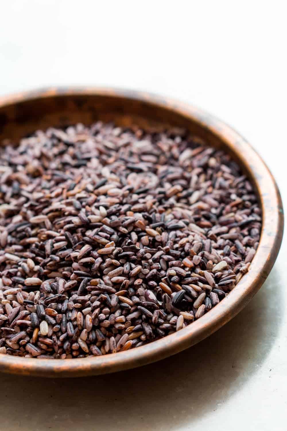 close up shot of uncooked black rice
