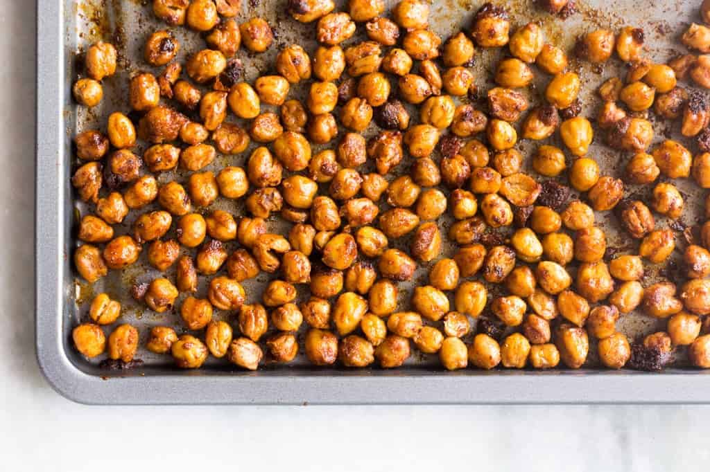 crunchy roasted indian masala chickpeas in a baking tray