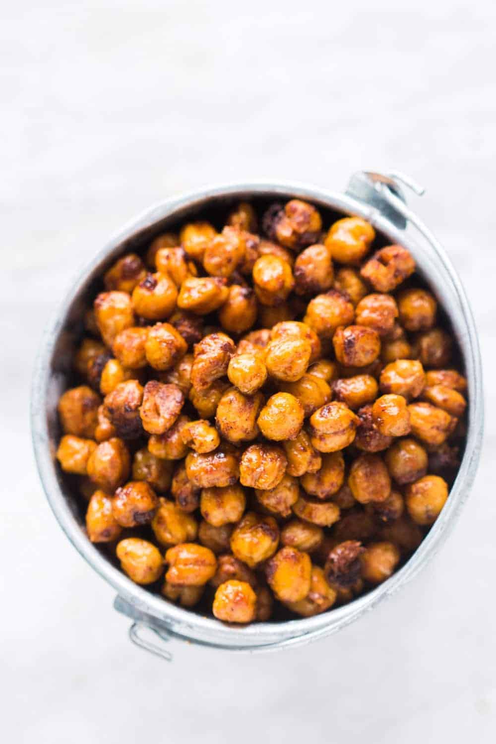 crunchy roasted indian masala chickpeas in a small bucket vessel