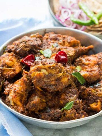 A bowl full of Spicy Chettinad Pepper Chicken Fry/Roast
