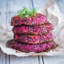 Beet and Goat Cheese Quinoa Patties stacked on each other.