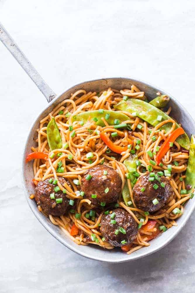 one pan veg noodle and manchurian stir fry served in a pan