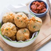 Chinese Potli Samosa Wontons served with a spicy schezwan sauce for dipping.
