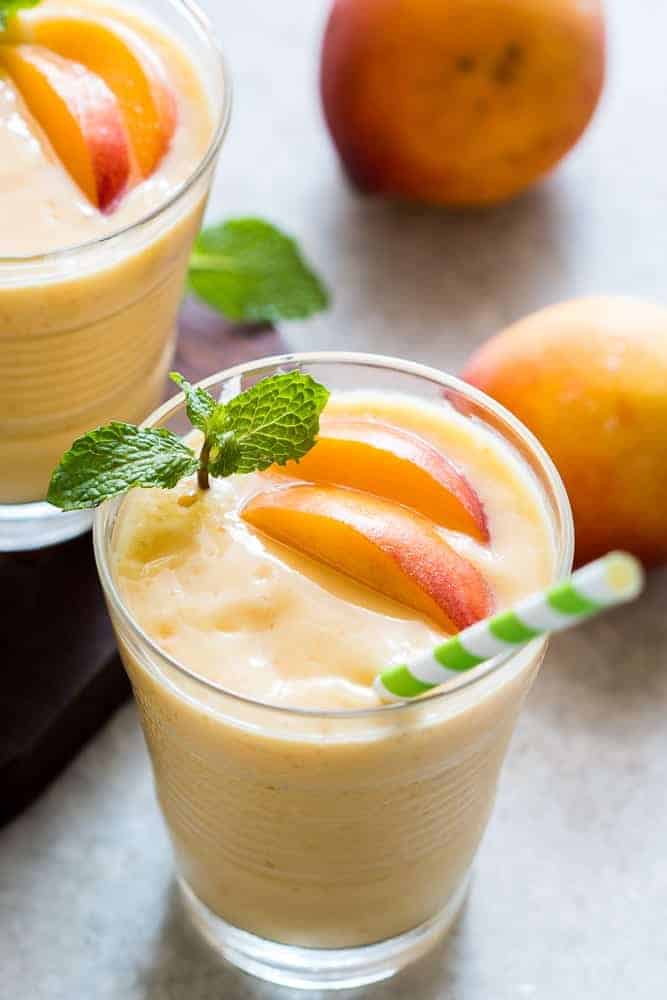 This healthy peach mango smoothie is vegan and the frozen fruit makes it thick and dessert like! Also get my top tips for making the best smoothies!
