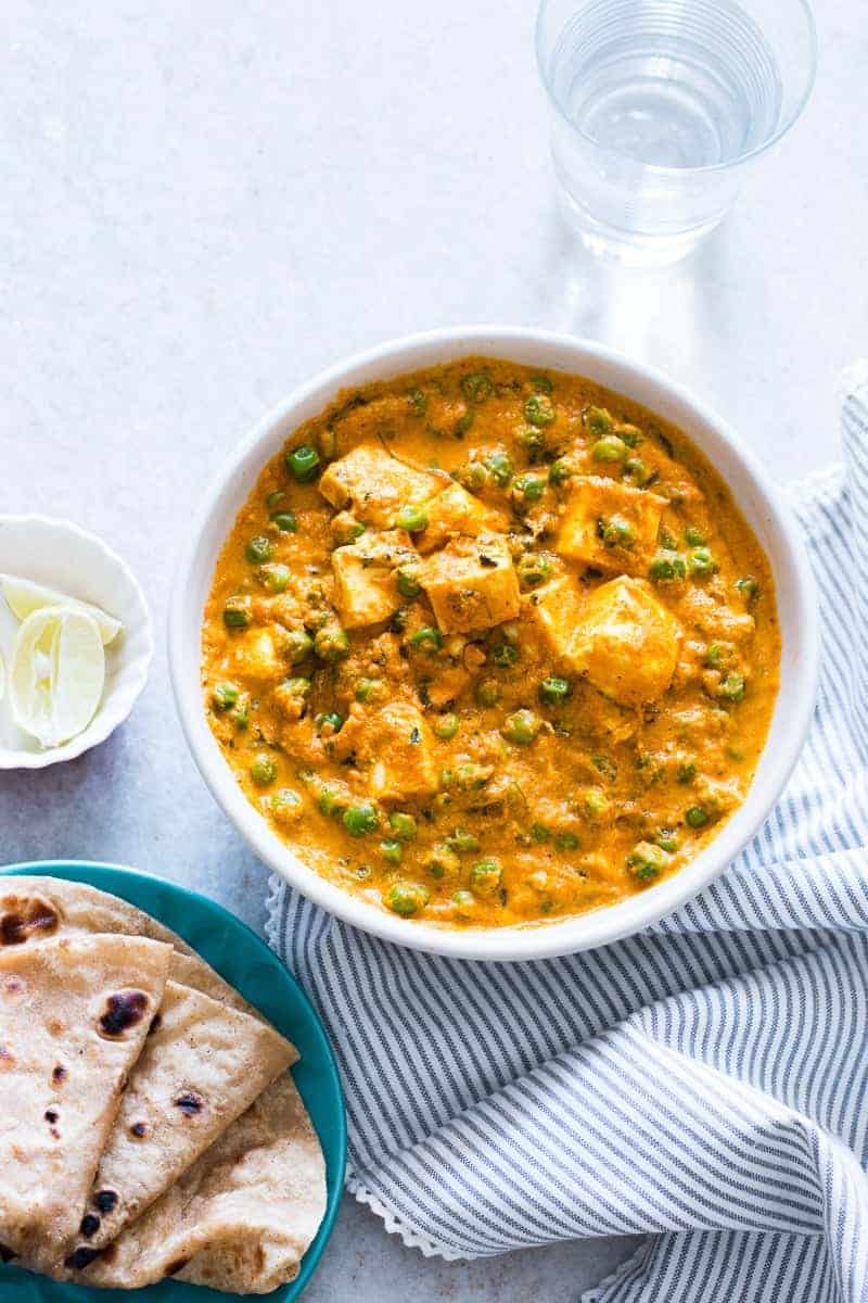 Indian food doesn't have to be difficult - this creamy matar paneer curry recipe is easy, one pot, home style and ready in under 30 mins. Gluten free, and can be made vegan by swapping paneer (cottage cheese) for tofu and yogurt for coconut milk in the recipe. Serve with rice and chapatis.