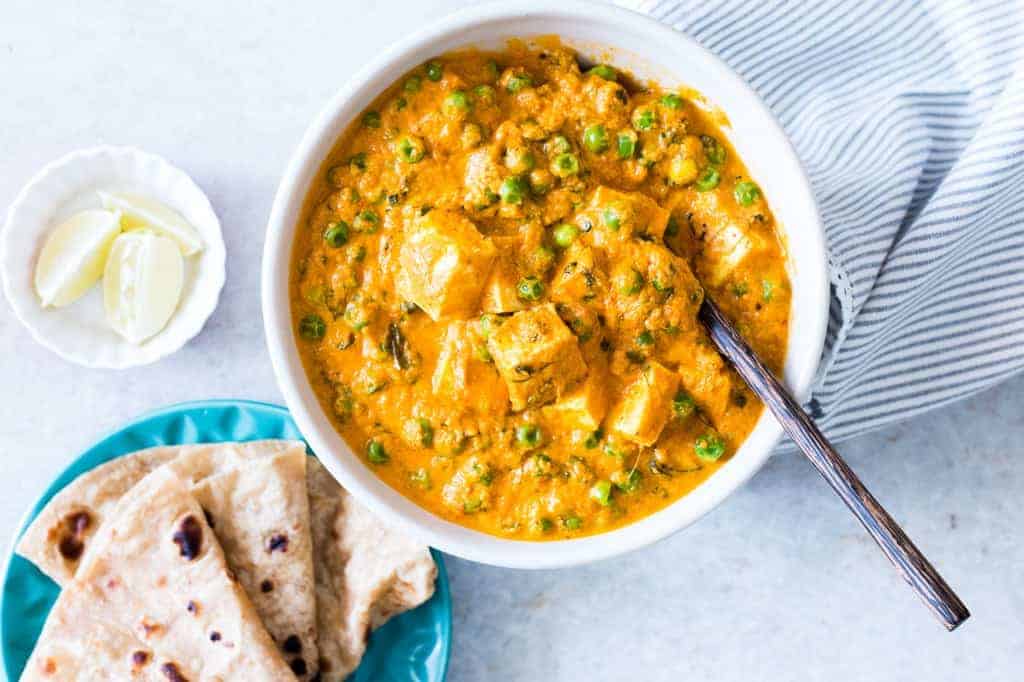 Easy to follow recipe for creamy matar paneer curry which is ready in under 30 minutes. Comforting and home style, this ghar ka khana recipe is a winner!