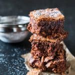Easy, gluten free brownies made with chickpea flour (besan) are fudgy, chocolatey and irresistible! You will never guess that there is no all purpose flour in this healthy treat.