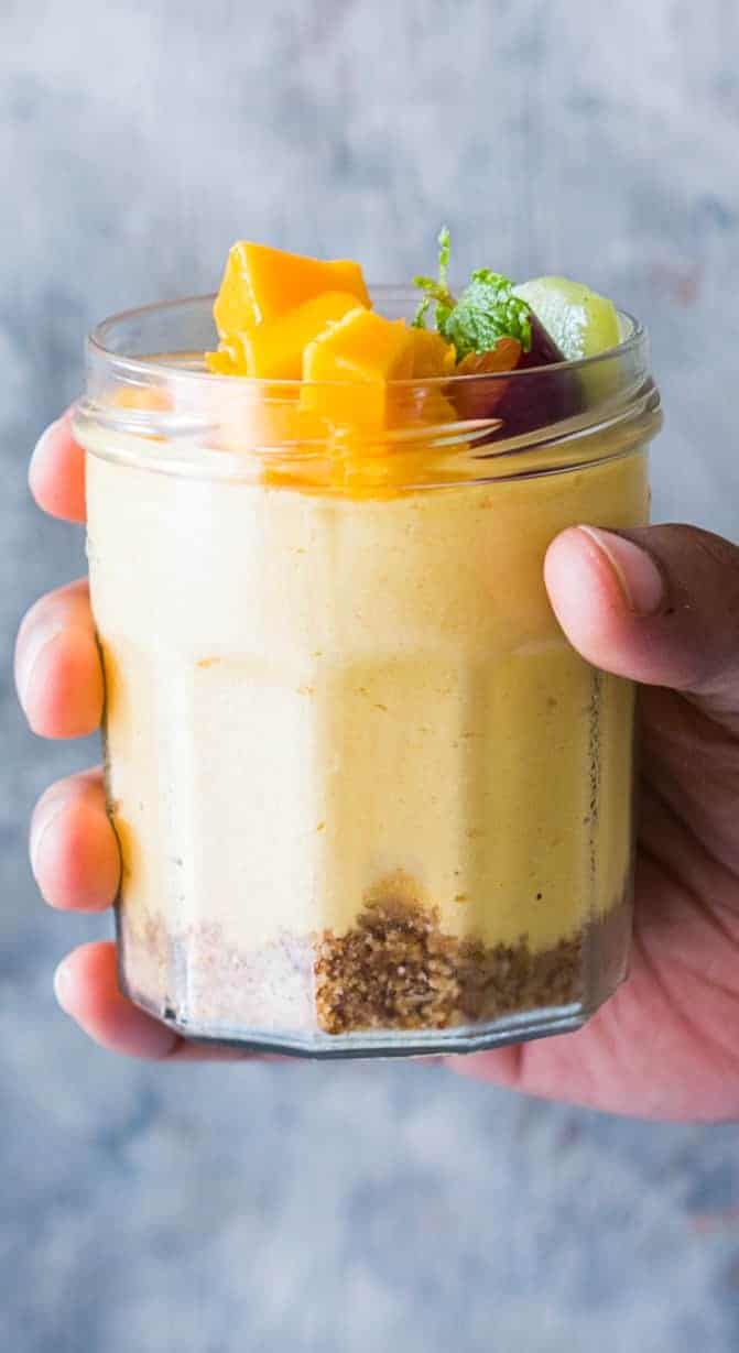 Easy 8 ingredient and no bake mango cheesecake mousse jars are insanely delicious, creamy dessert jars! Perfect weekend treat!