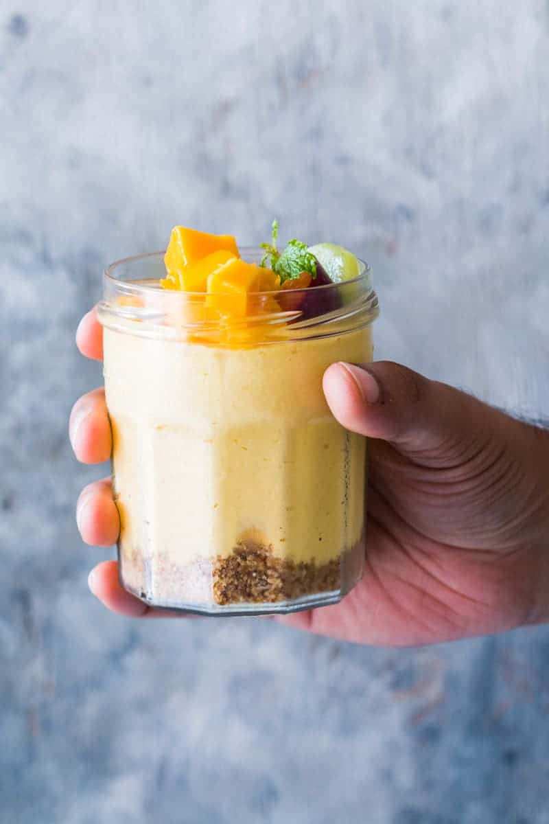 Easy 8 ingredient and no bake mango cheesecake mousse jars are insanely delicious, creamy dessert jars! Perfect weekend treat!