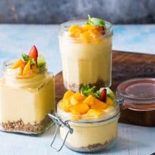 No Bake Mango Cheesecake Mousse served in jars that are perfect for gifting.