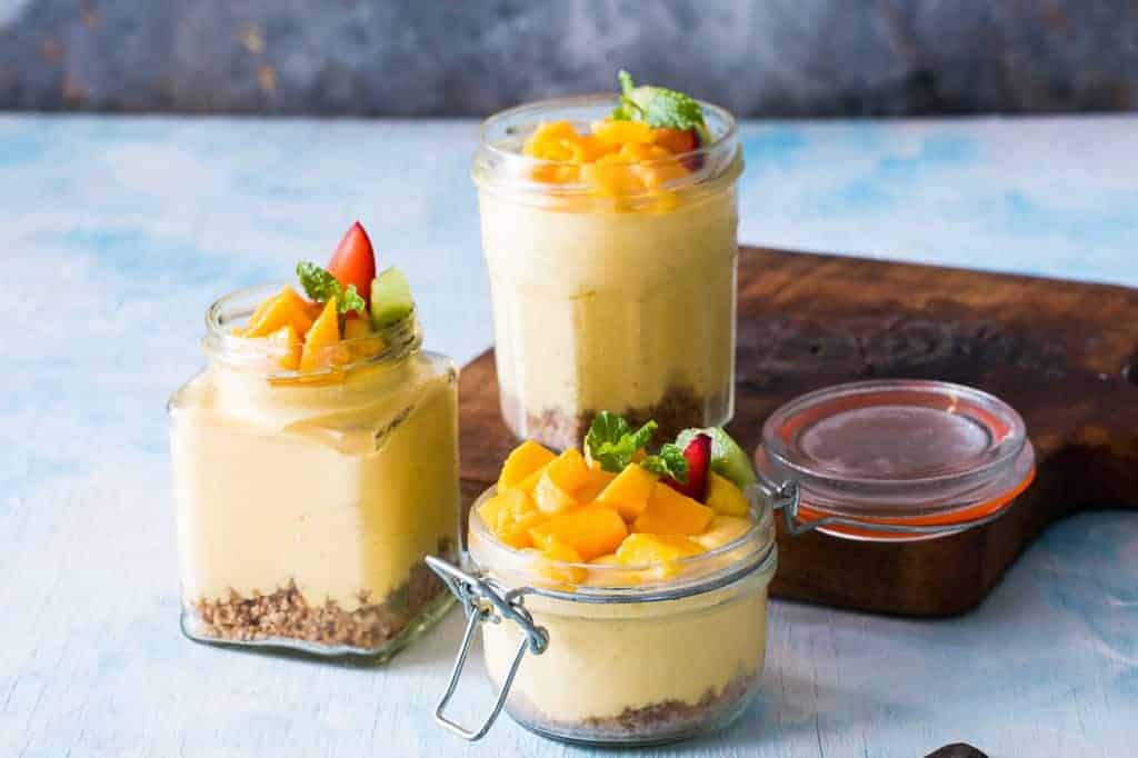 No Bake Mango Cheesecake Mousse served in jars that are perfect for gifting.