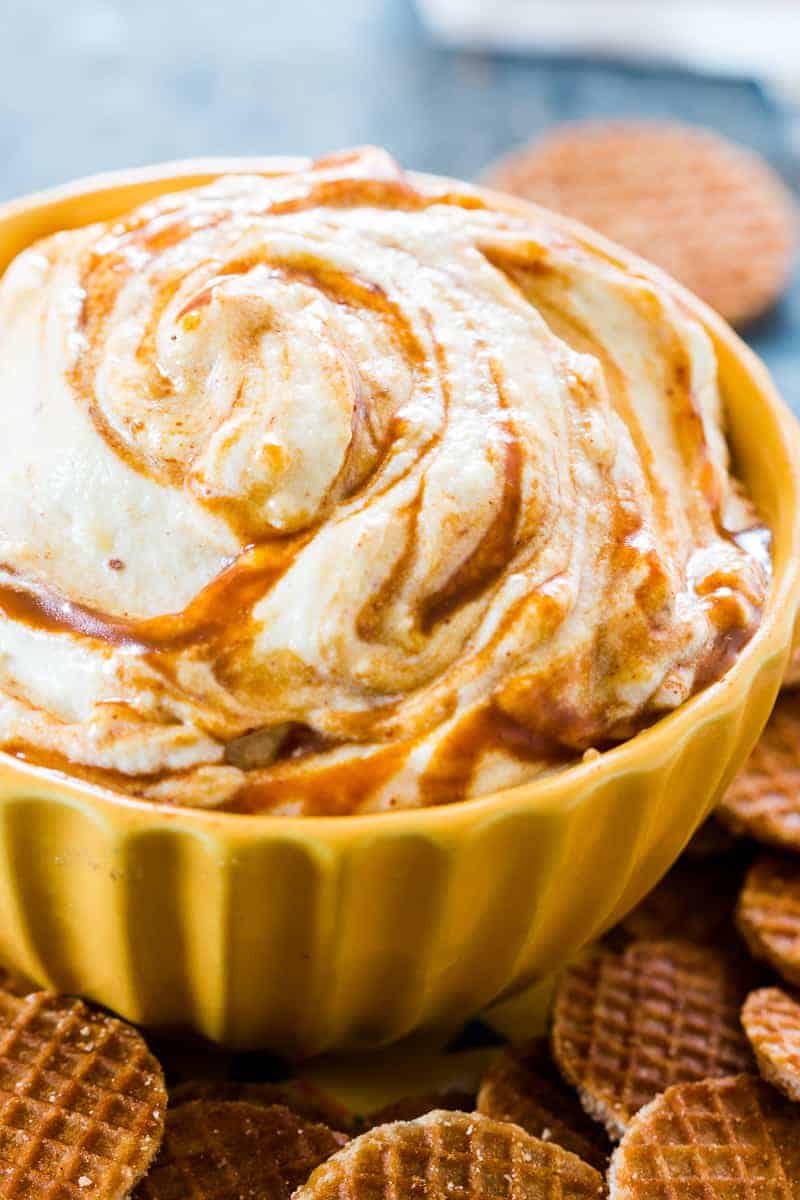 This caramel pumpkin pie cheesecake dip is a breeze to make and the perfect fall holiday appetizer or dessert. We use whipped cream instead of Cool Whip for more volume and flavour. That's one less processed ingredient for you to worry about, which makes this slightly healthier too. Serve it with graham crackers or like we did - waffle bites!