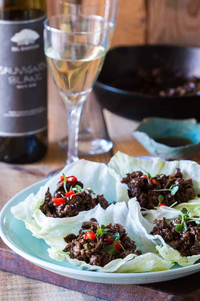 Easy, healthy and insanely delicious stir fried black bean chicken lettuce cups are perfect when you want dinner in 30 mins. Just 5 main ingredients in this gluten free recipe.