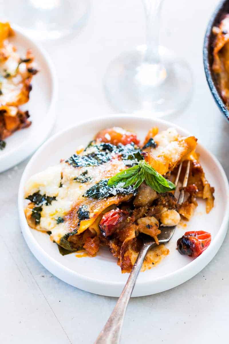 Easy 30 minute vegetarian lasagna skillet is fast, easy, healthy, loaded with veggies and still has carbs to keep us happy. You could add ricotta, cottage cheese to the recipe, or even make it with bow tie pasta or ravioli if you don't have lasagna sheets. Love busting out my cast iron for this one!