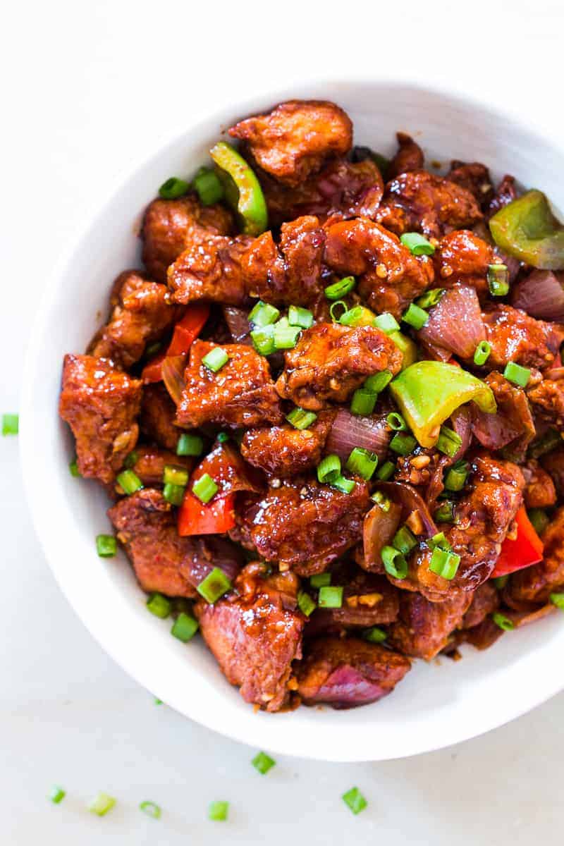 Easy recipe for Indian Chinese Chilli Chicken Dry. This will give you fool prool restaurant style chinese chilli chicken dry every time! It's sweet and sour, crispy and spicy. You can also make it with gravy, but dry is our favourite.