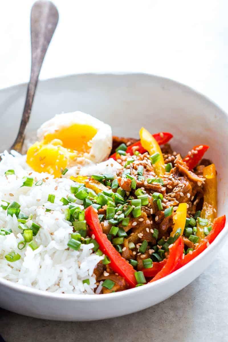 Easy Slow Cooker Korean Pork Bulgogi recipe that can be made in a crockpot and has spicy gochujang in it's marinade. Healthy, yummy stew that's perfect over rice for dinner!