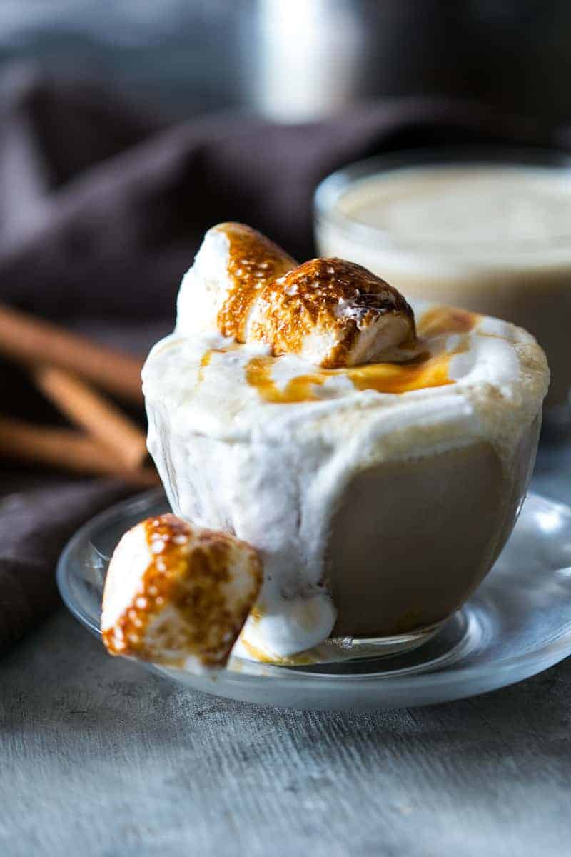 The best homemade butterbeer latte made with coffee, toffee and topped with toasted marshmallows. Just like the one you get at Starbucks!