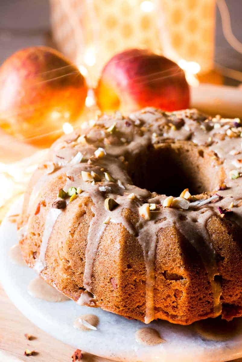 Garam Masala Eggless Apple Bundt Cake - easy, moist, spiced cake made with fresh apples and glazed with a brown butter rum sauce.