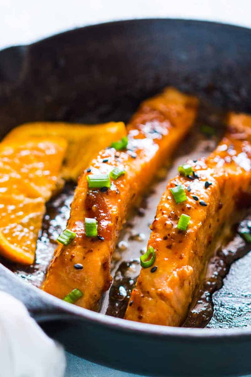 Pan seared orange mustard salmon - easy, healthy, 15 minute dinner with a sticky marinade. Clean eating ingredients, serve with pasta, cauliflower rice or asparagus