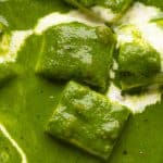 Closeup of the palak paneer gravy to show the luxurious, rich curry base