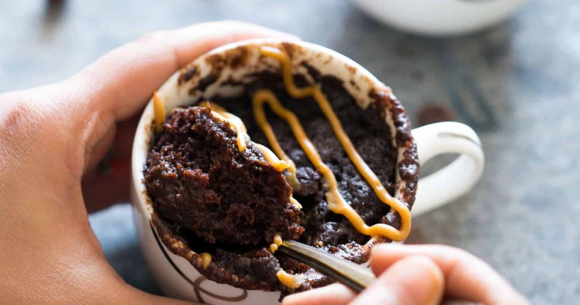 Stealing a bite from the mug cake.