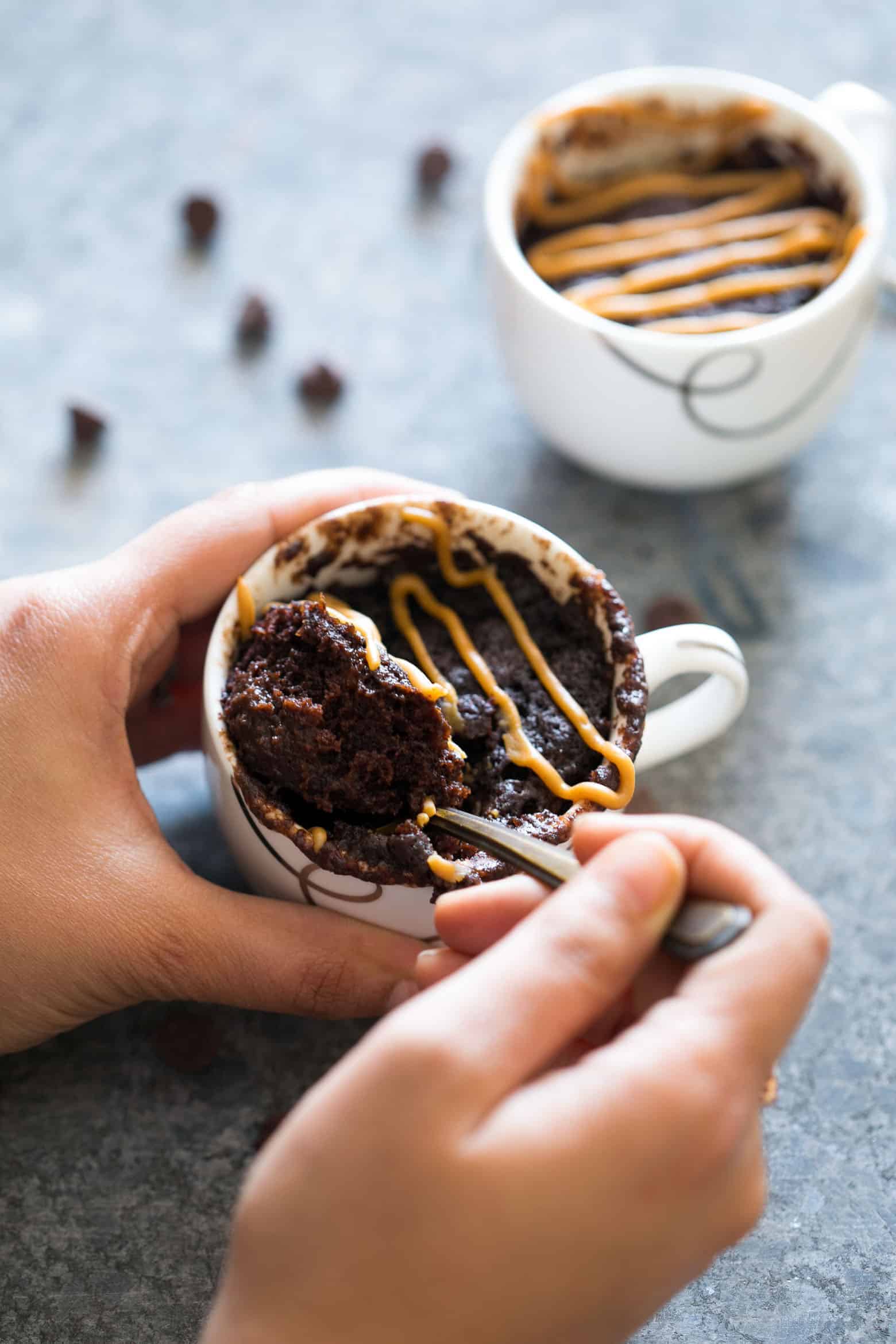 Single serving eggless banana chocolate peanut butter mug cake is the best, gooey and the moistest mug cake recipe you'll try. Ready in under 5 minutes and just needs a microwave!