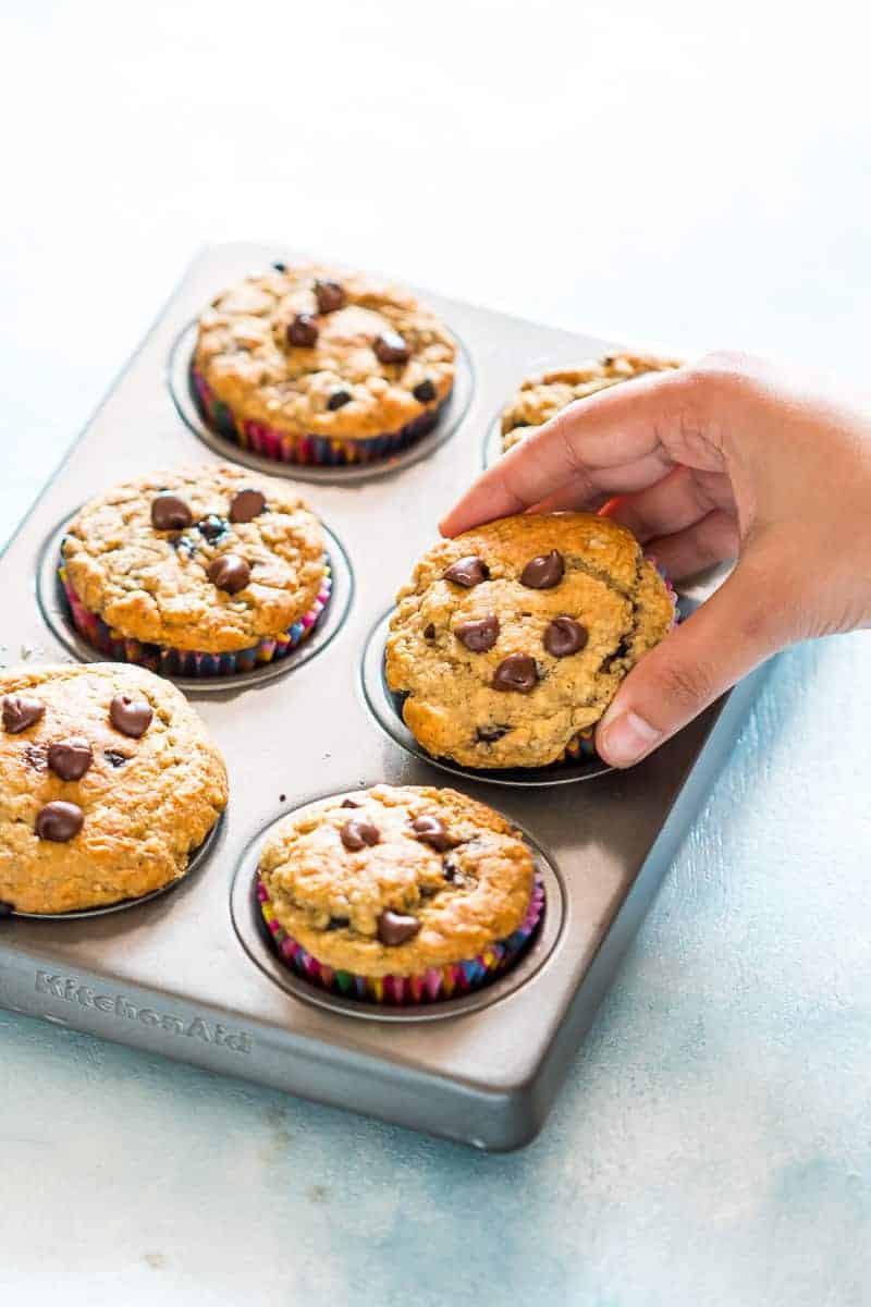 Healthy Oatmeal Banana Chocolate Chips Muffins are super easy, extremely soft and fluffy; have almost no flour, and are perfect for breakfast!