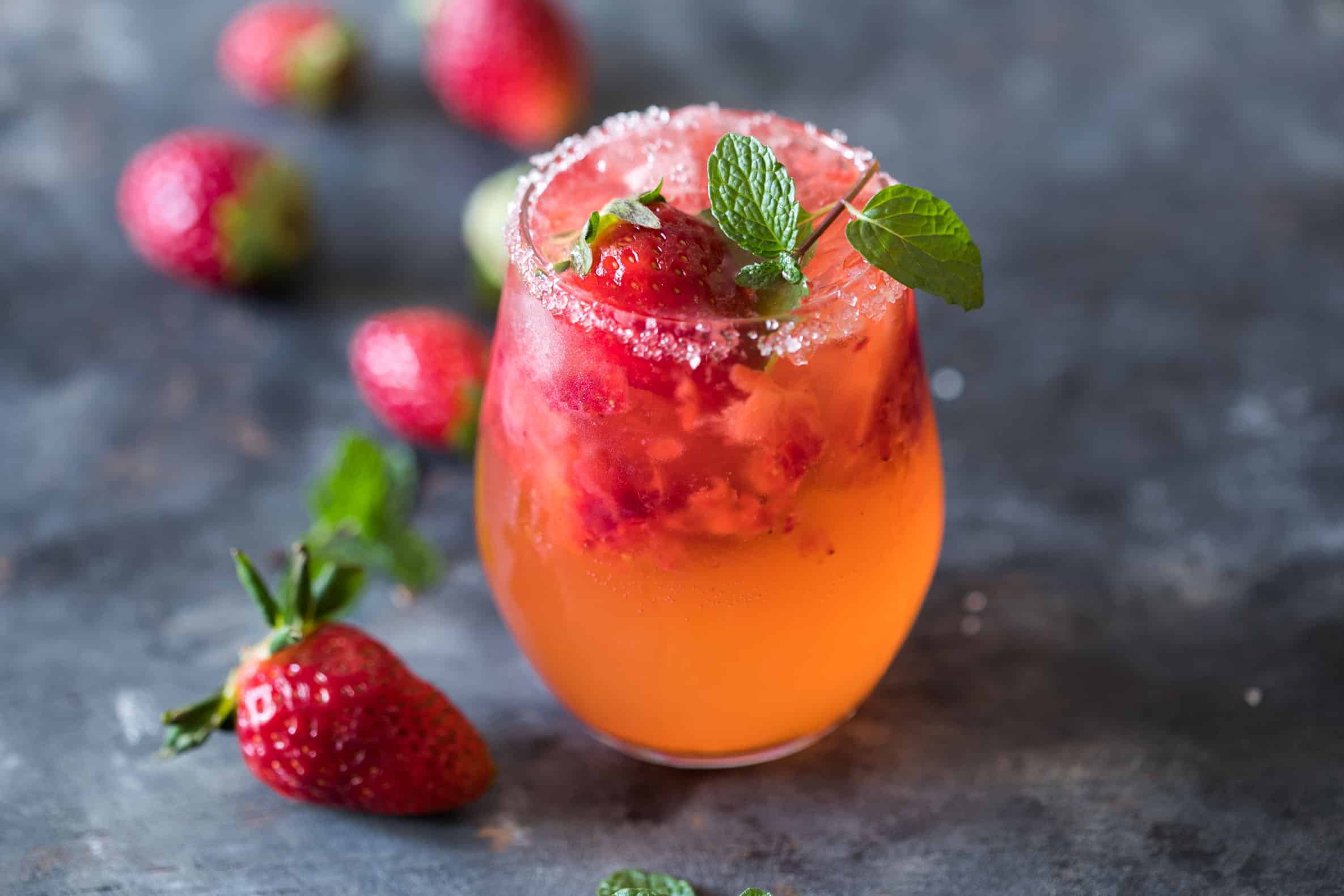 Mint Strawberry Moscow Mule is the perfect summer cocktail. Made with vodka and ginger beer it's super easy and our go to drink these days!