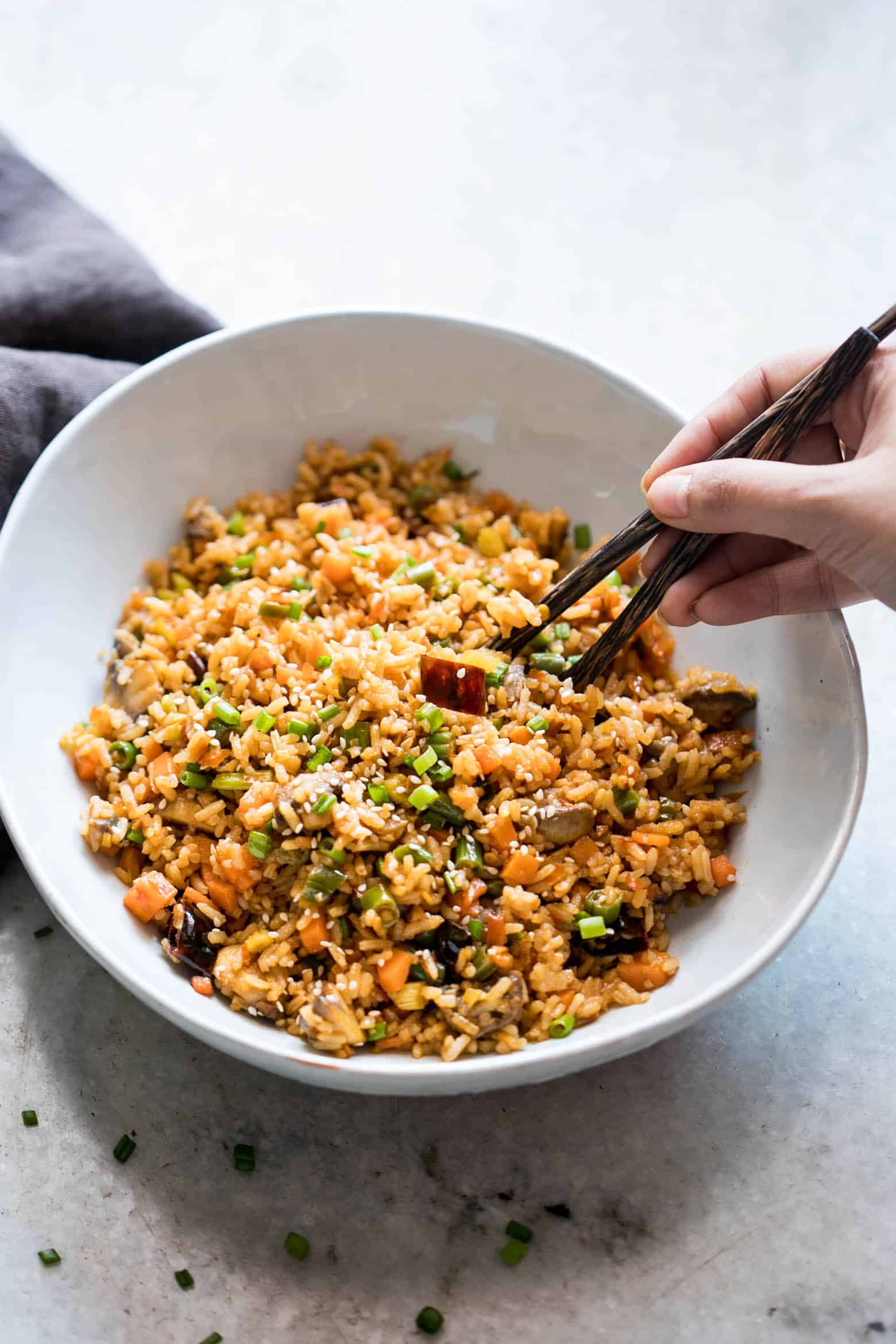 This is the best chinese schezwan fried rice you'll make - loaded with vegetables, spicy and super easy! Made with sichuan sauce, it's the best way to use leftover rice.