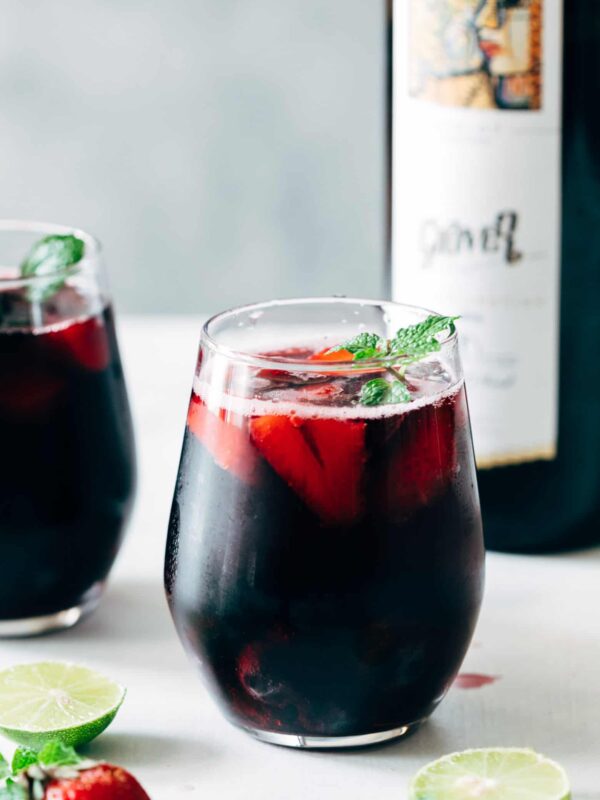 Summer Berry Red Wine Spritzer served with mint in glasses.
