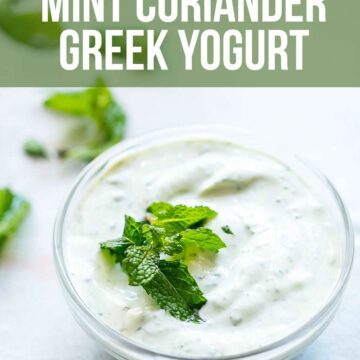 mint coriander greek yogurt served in a bowl with fresh mint on top