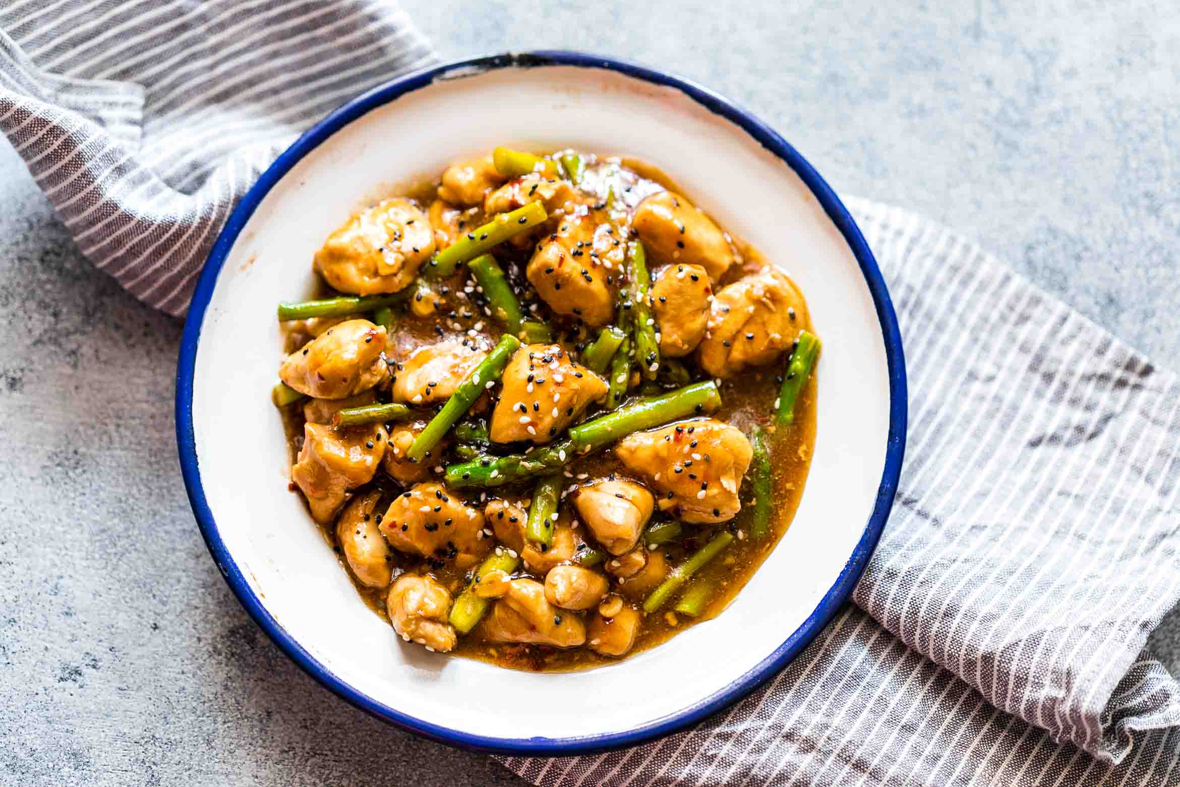 Easy lemon ginger chicken asparagus stir fry is a quick, 30 minute asian recipe that's sure to be a hit with the family. It's low carb and can gluten free too so you can enjoy it guilt-free!