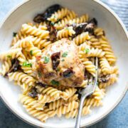 Creamy Sun-dried Tomato Chicken served with Pasta in a bowl.