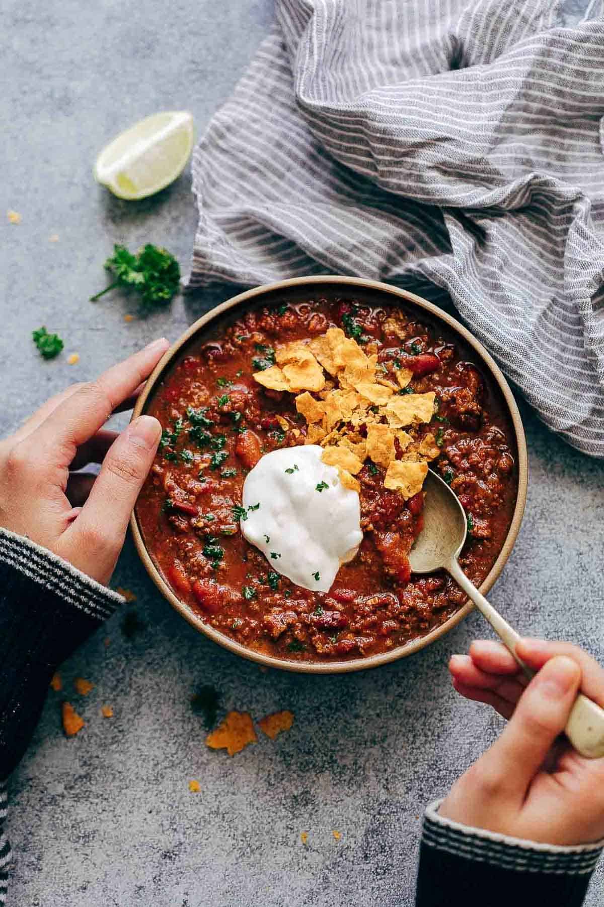 Instant Pot Chipotle Chili is the easiest and fastest way to make chili at home. It's spicy, homemade, comfort food that will keep you warm and makes for a great one pot family dinner. Leftovers taste even better the next day! 