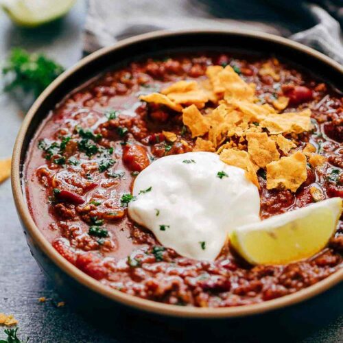 Instant Pot Chipotle Chili is the easiest and fastest way to make chili at home. It's spicy, homemade, comfort food that will keep you warm and makes for a great one pot family dinner. Leftovers taste even better the next day! 
