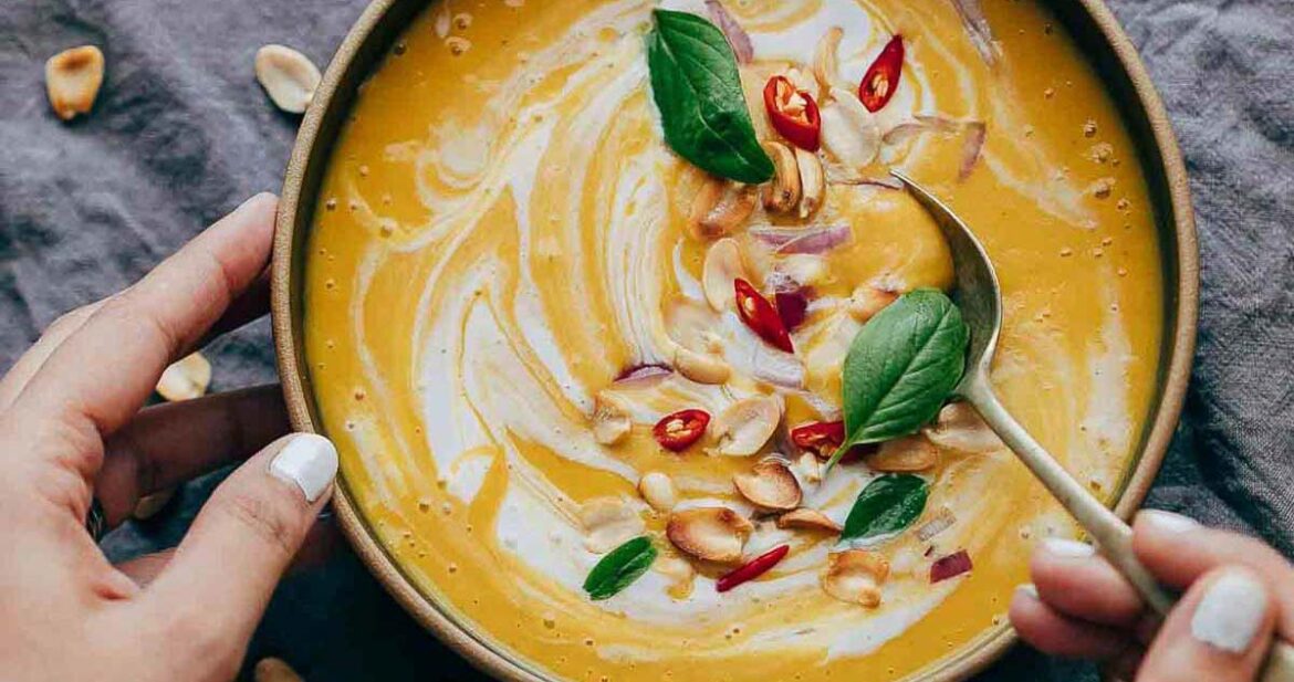 This Thai Butternut Squash Sweet Potato Bisque is perfect for cold winter days - super thick and creamy soup with a hint of heat that will keep you warm and cozy. It has all the fall flavours and ingredients - onions, carrots, butternut squash, sweet potato, thai curry paste and coconut milk.