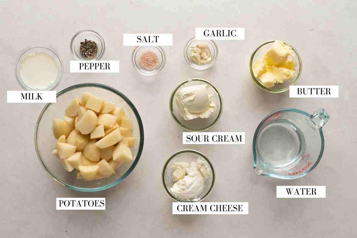 Picture of all the ingredients for garlic mashed potatoes made in the instant pot with text to identify them
