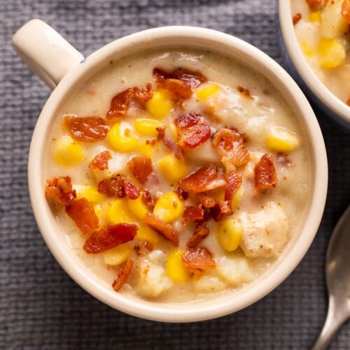 Picture of instant pot chicken potato corn chowder served in a bowl with bacon sprinkled on top