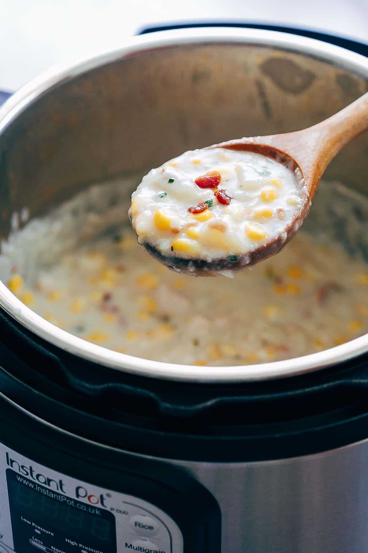 Instant Pot Chicken Potato Corn Chowder with Bacon being served.